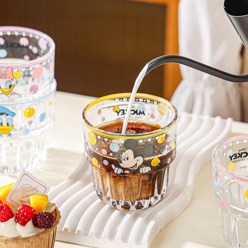 Nueva taza de vidrio de patrón vertical de Disney, taza de agua de dibujos animados de lunares, taza de agua para el hogar de alto valor femenino, taza de agua para la oficina