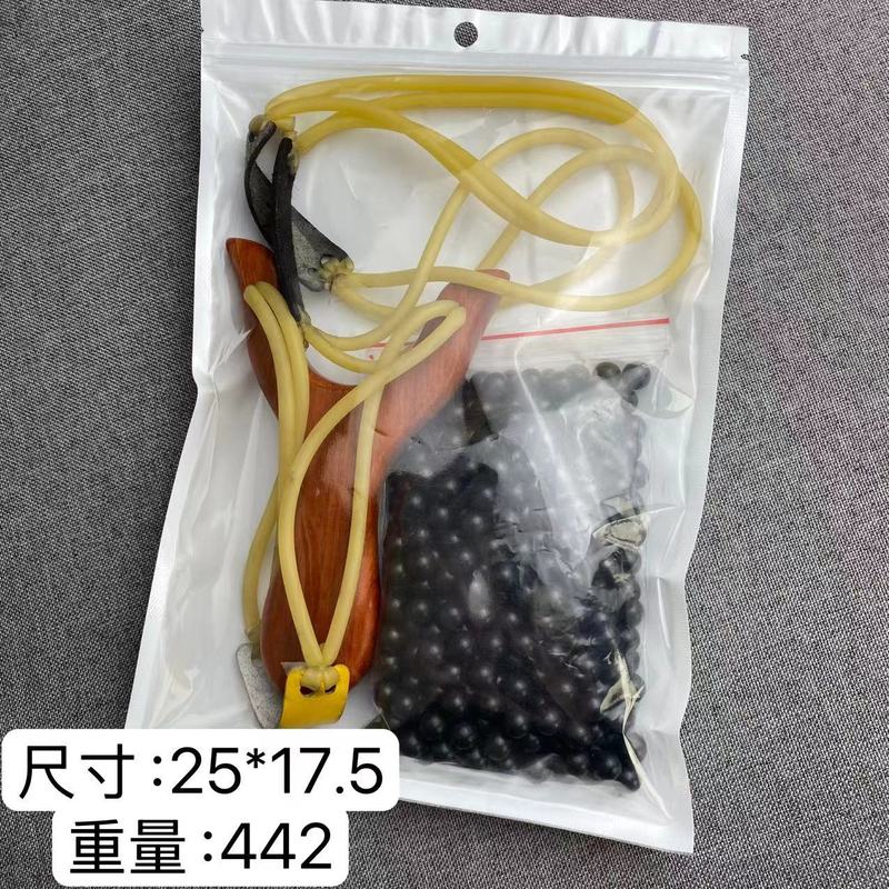 手羽の木の赤い花梨の木のパチンコの木のパチンコの屋外の文はパチンコの平たい皮の筋のパチンコを遊びます。|undefined