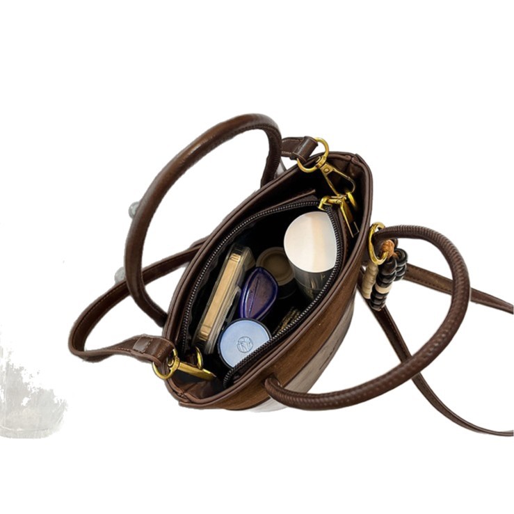 Coreano de seda doble bolso de cubo de color contraste para mujeres 2025 nueva moda versátil bolso de hombro bolso de brazo