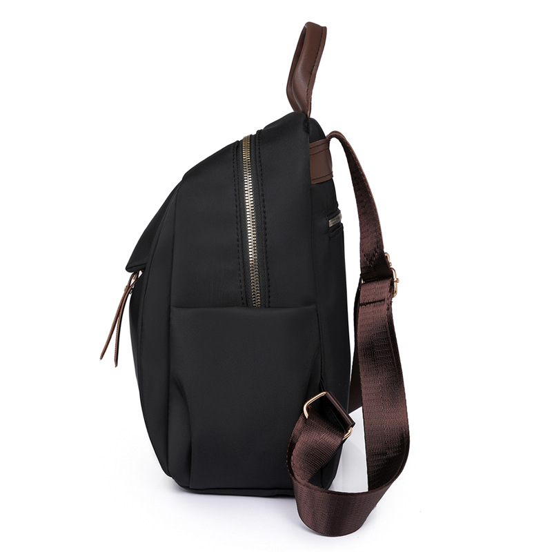 Fábrica al por mayor 2023 nueva mochila de nailon casual para mujer, mochila de viaje urbana simple de moda, mochila escolar
