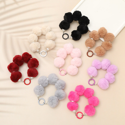 Autumn and winter new Korean version plush ball pendant handmade beaded mobile phone pendant short bracelet anti-lost chain for women