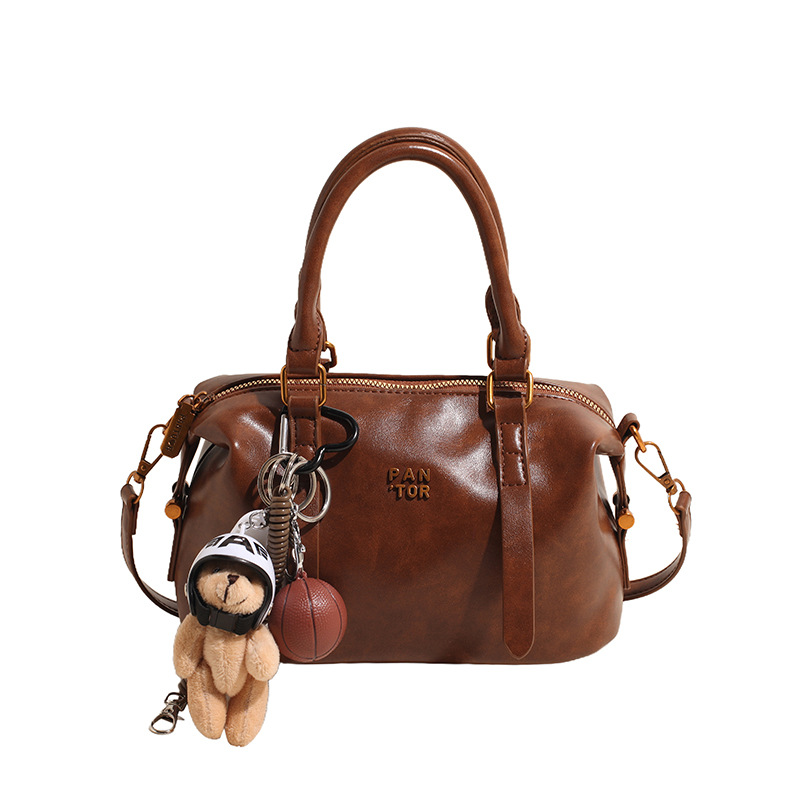 Bolso de almohada de moda de mano, bolso de hombro de alta calidad coreano, bolso de nicho de invierno de 2024 para mujeres simples