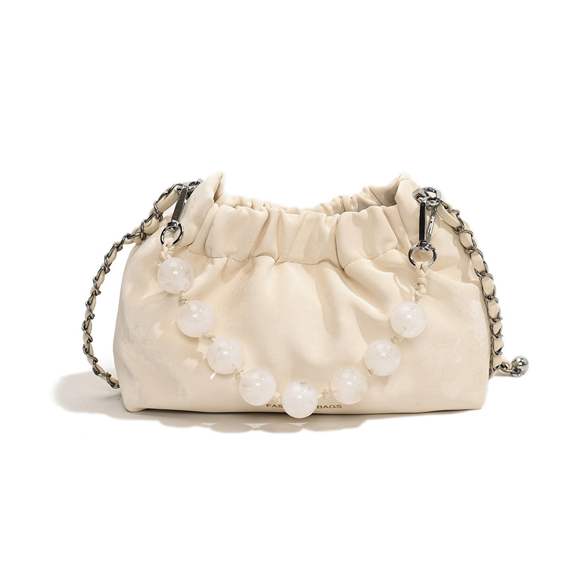 2024 nuevo bolso de perla de moda de mujeres bolso de nube plegado nicho cadena de hombro bolso de cubo
