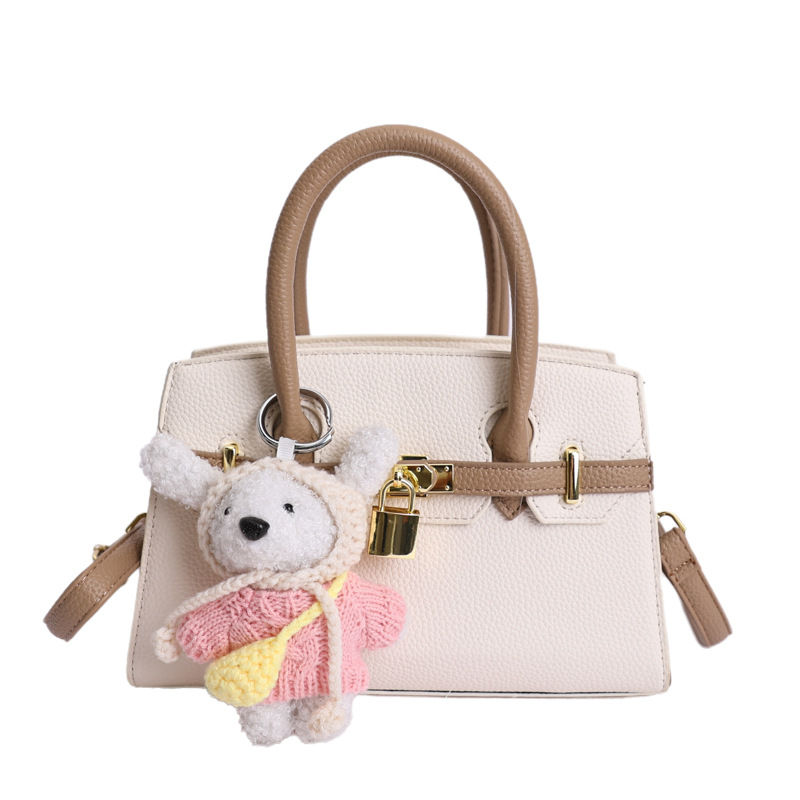 Coreano simple bolso de mano mujer 2026 primavera nueva bolsa de viaje diario texturizada bolso de mochila