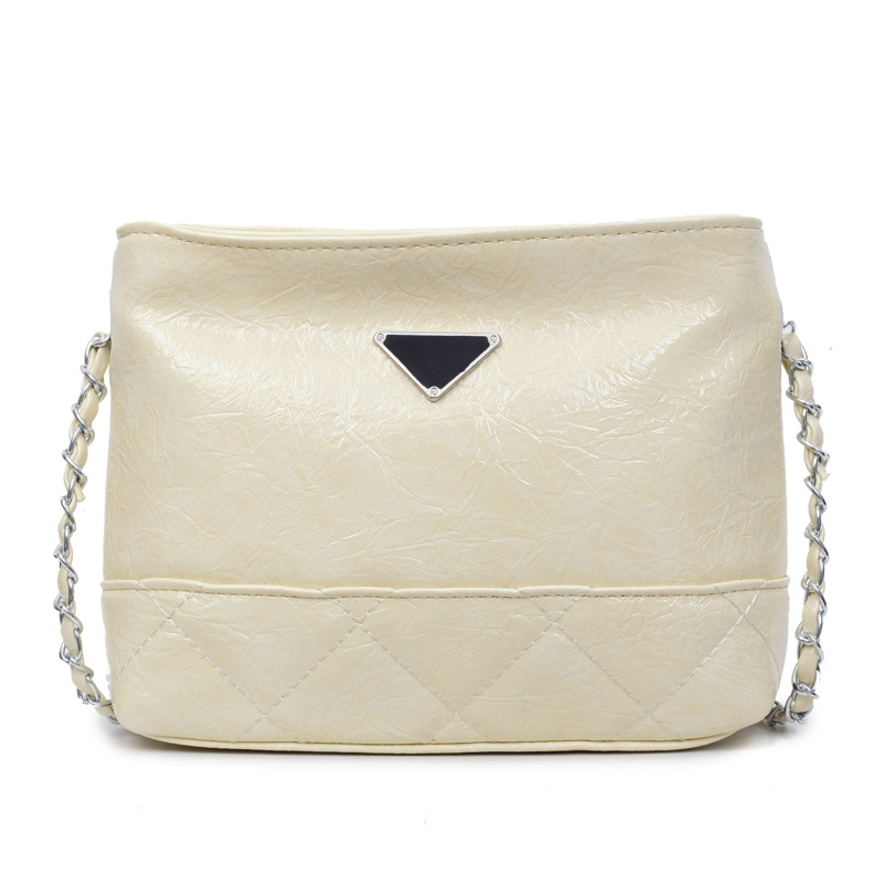 Bolsa de cadena de textura de alta calidad 2025 verano nuevo estilo bolso femenino moda patrón de agarre de mano bolso bandolera bordado con rombos