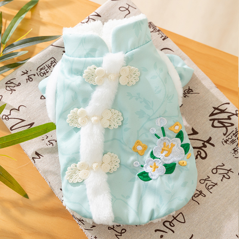 Otoño y invierno perros cheongsam chino Tang traje gato dos patas cálidas mangas volantes ropa de algodón de ciruela de Año Nuevo ropa de perro mascota