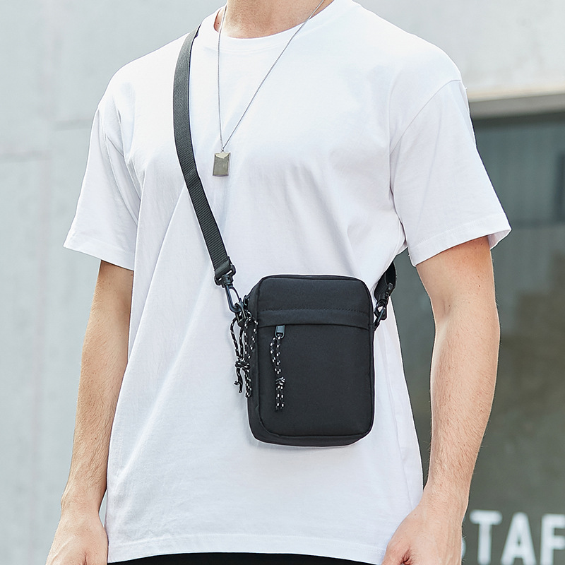 Bolso pequeño para hombre bolso de hombro para hombre bolso de hombro pequeño oblicuo mini bolso colgante casual simple marca de moda mochila pequeña ligera