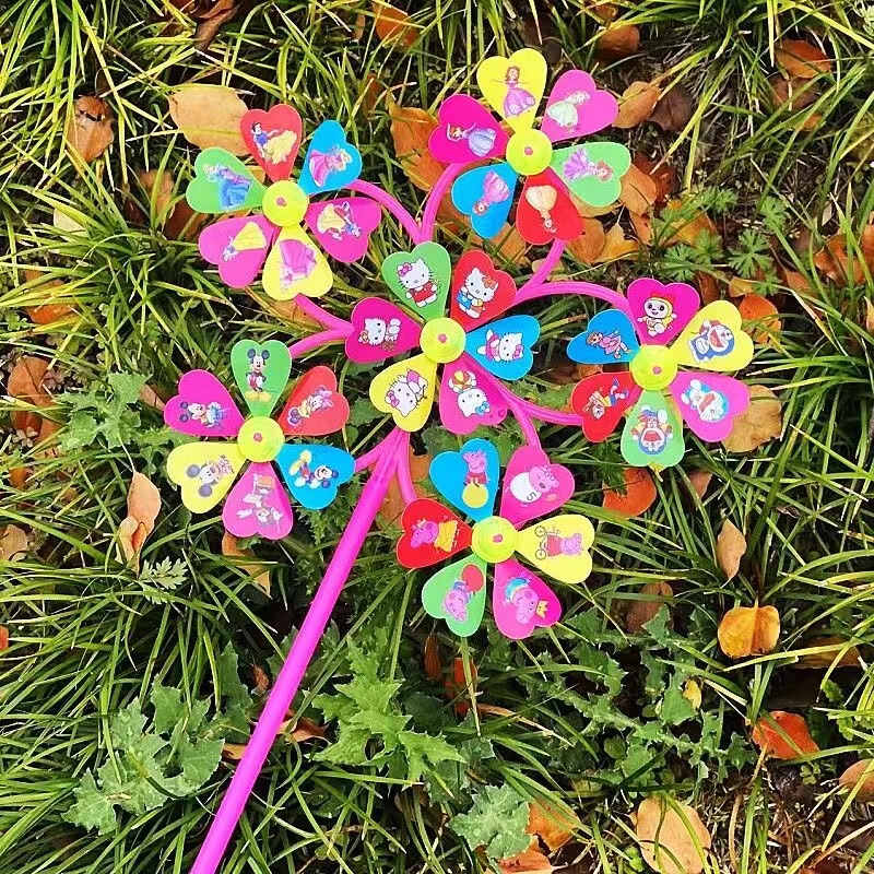 Manufacturer Wholesale Outdoor Courtyard Decoration Children's Toys Spring Outing Scenic Area Square Stall Colorful Six-Wheel Smiley Windmill