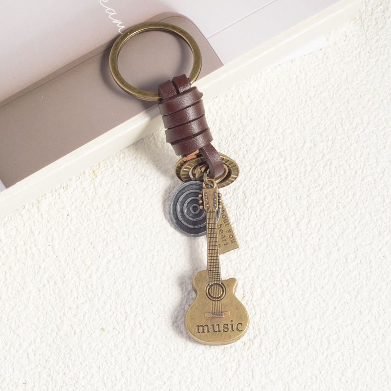 Creative key chain men and women small gift alloy cute alloy animal vintage woven leather key chain key chain