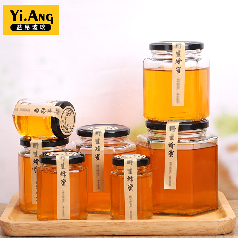 批发六棱蜂蜜玻璃瓶透明密封罐头瓶柠檬膏辣椒酱菜空瓶杂粮储物罐