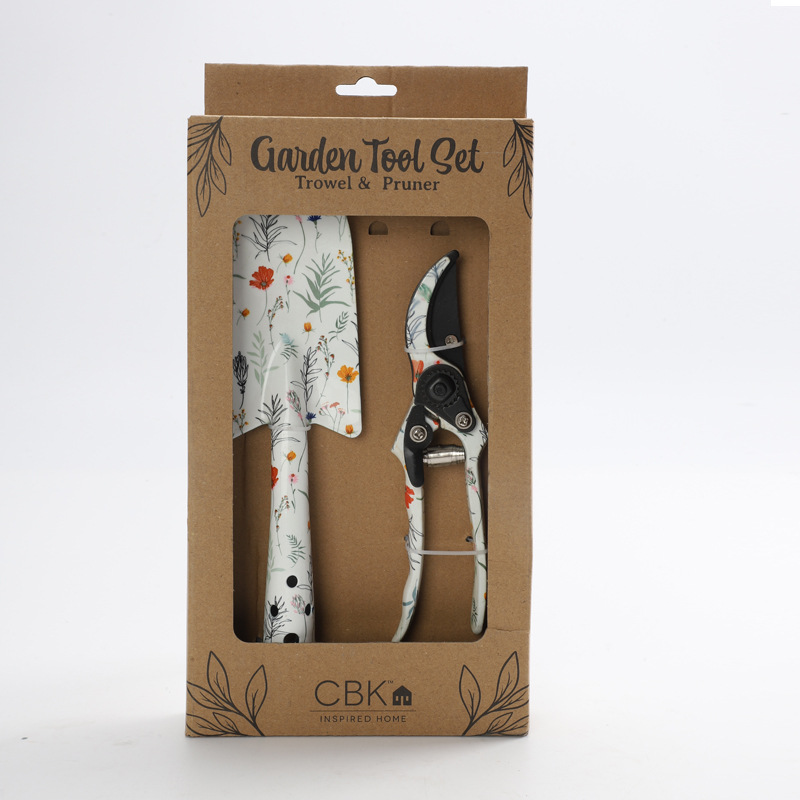 Herramientas al aire libre textura de impresión de flores pequeñas herramientas de jardín conjunto de tres piezas de impresión pala jardín flores y plantas herramientas de jardinería