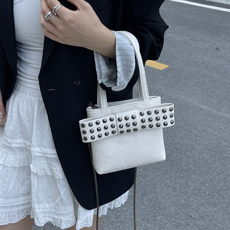 Bolso de textura transfronteriza 2025 nuevo bolso de cadena retro bowknot bandolera moda remache bandolera