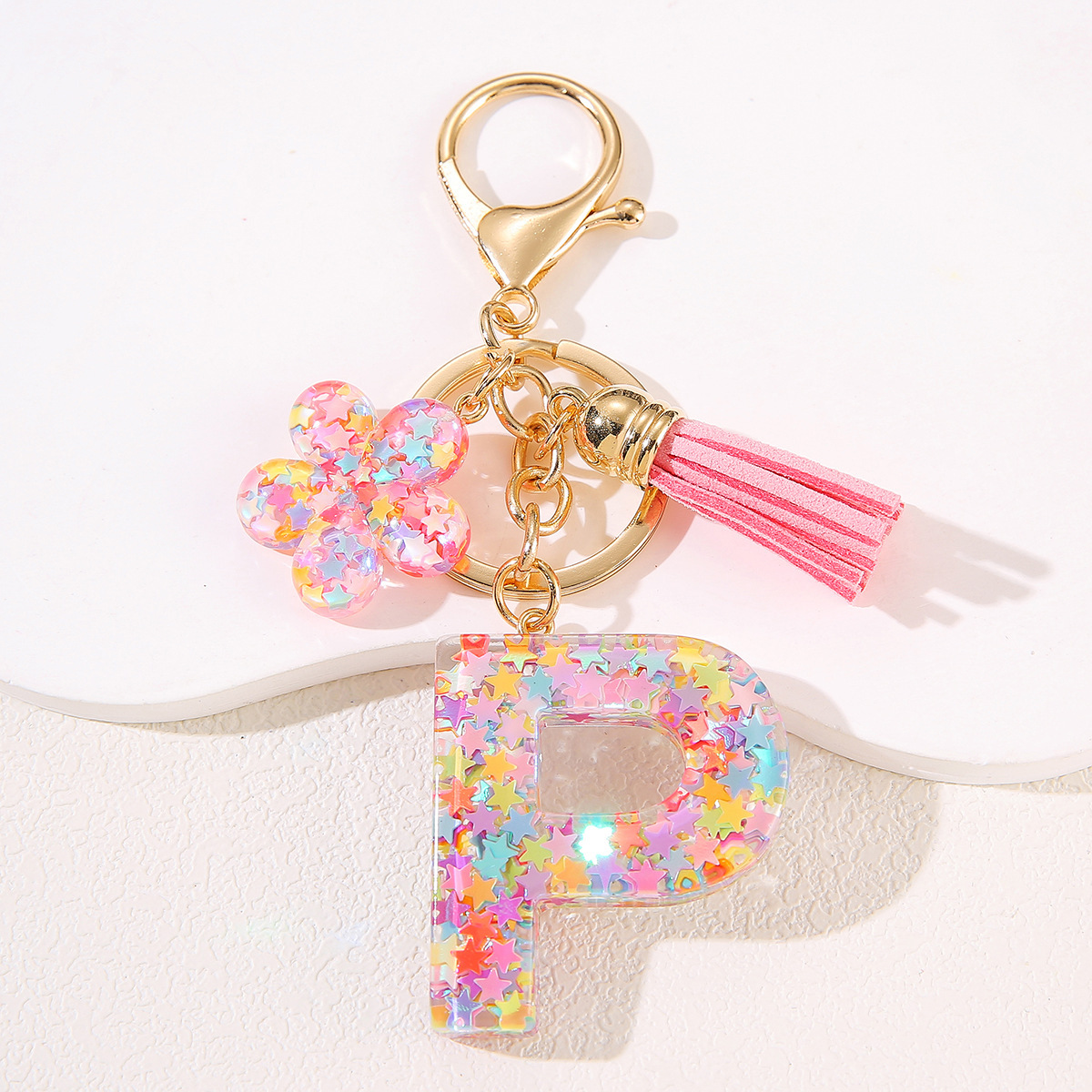 Un nuevo llavero flor de goteo de goma esquinilla 26 letras bolsos colgante llavero accesorios Yiwu