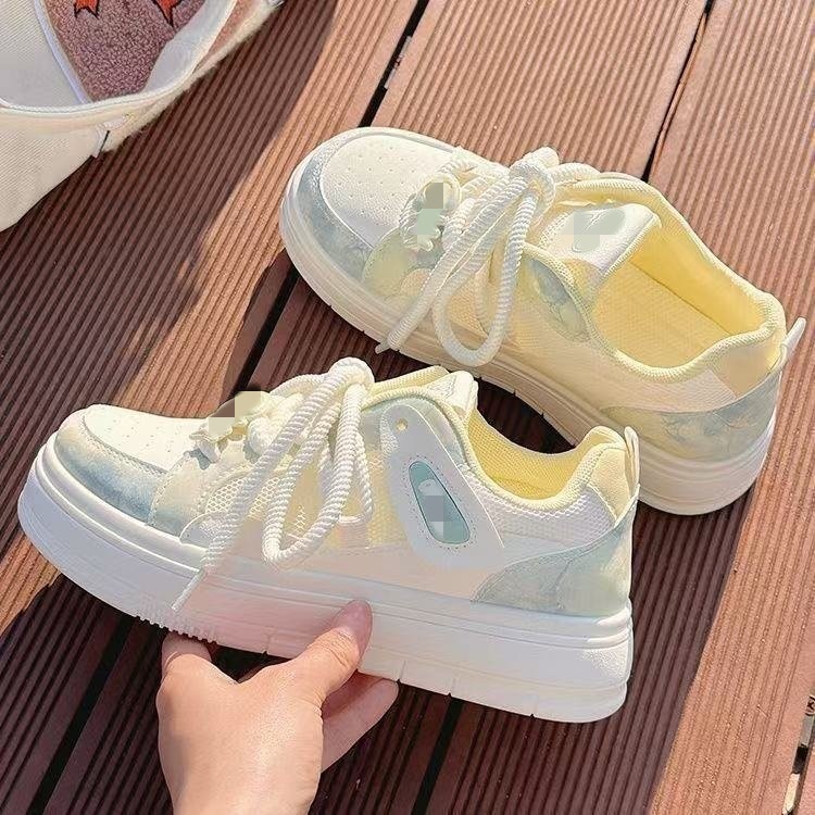 Zapatos de mujer de verano zapatos blancos 2026 nuevo nicho de malla transpirable zapatos de pan de suela gruesa zapatos de skate de moda para mujeres