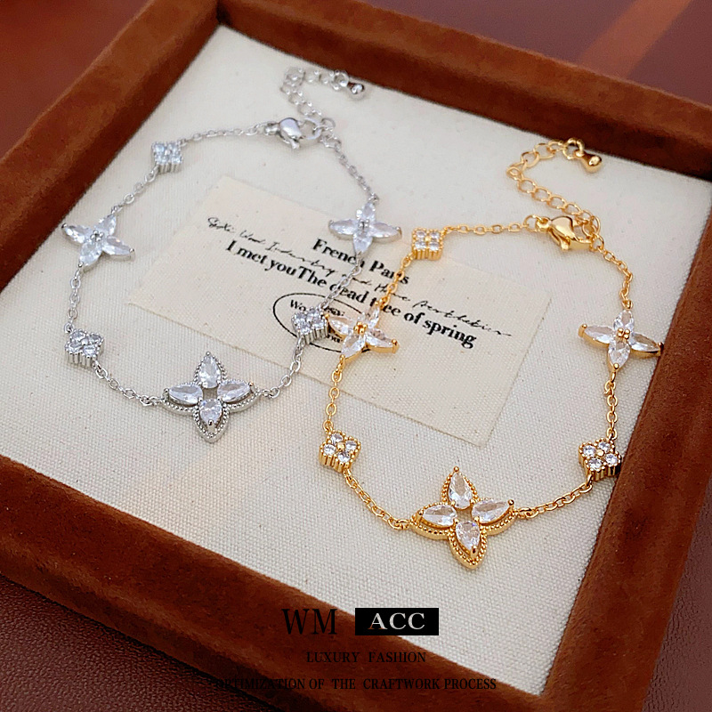 Brazalete de flores de oro real, pulsera de piedra de diamante, simple y de alto nivel, pulsera universal, nicho, lujo ligero, joyas de mano exquisitas para mujeres.
