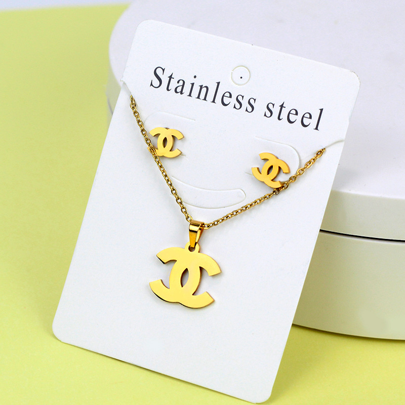 Conjunto de collar de pendientes de oro de acero inoxidable europeo y americano, collar de mariposa de amor de diamante, colgante, cadena de clavícula, fábrica al por mayor