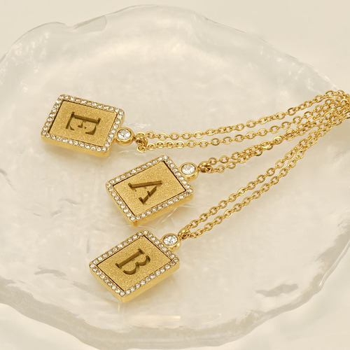 European and American INS style titanium steel sand-pressed hollow 26 English letter pendant 18K stainless steel diamond letter necklace for women