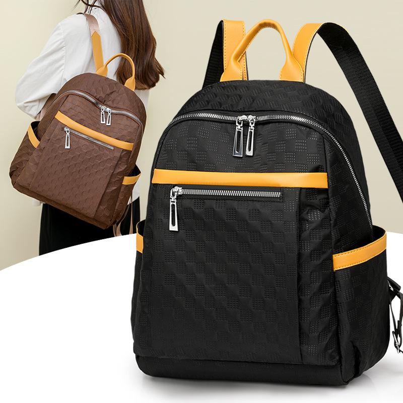 2024 otoño nuevas señoras mochila de nailon moda todo-fósforo viajes al aire libre contraste color mochila de gran capacidad al por mayor