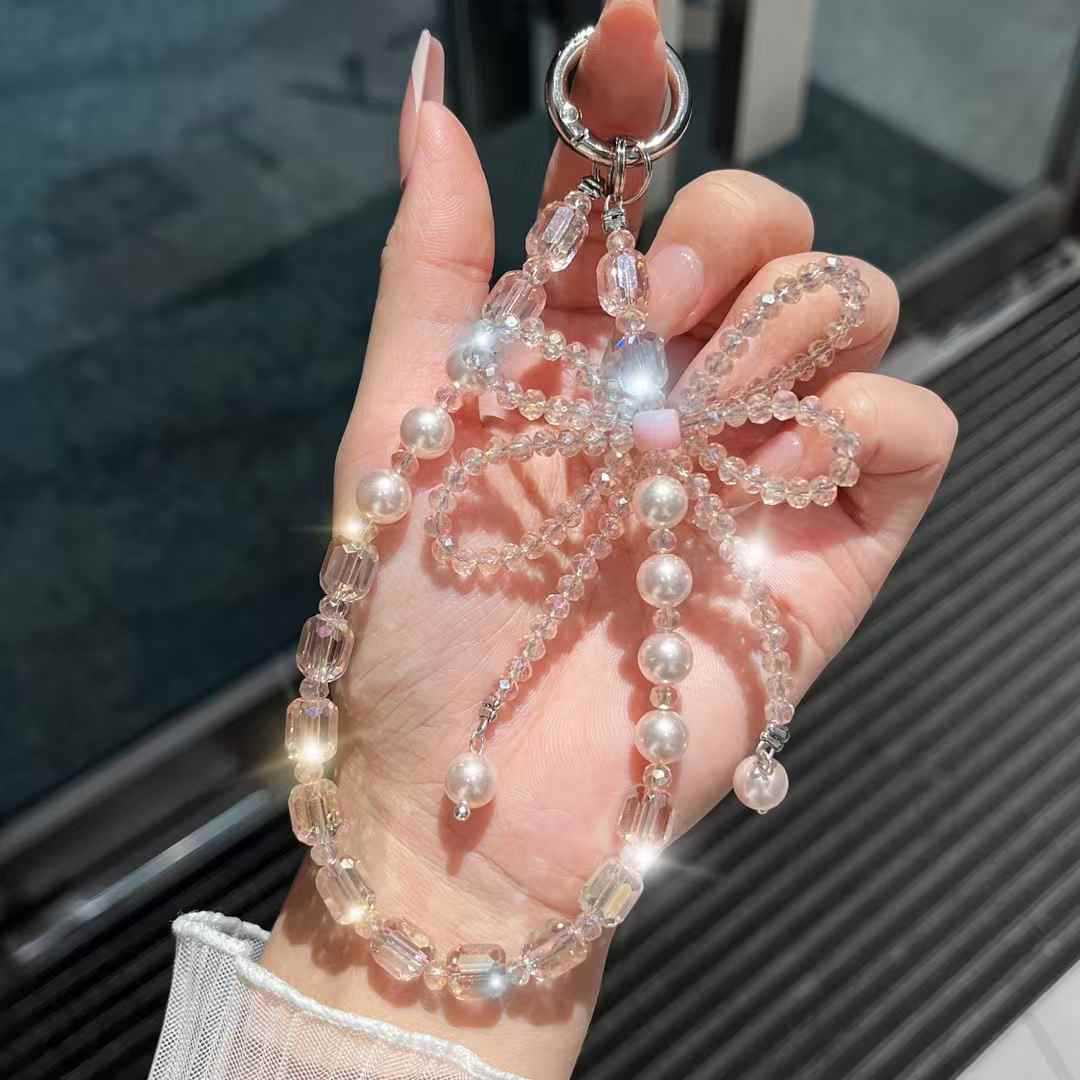 cadena de teléfono móvil estereoscópico de alta calidad arco de cristal caja de teléfono móvil colgante perla cuerdas de muñeca cuerdas de cuentas mujeres