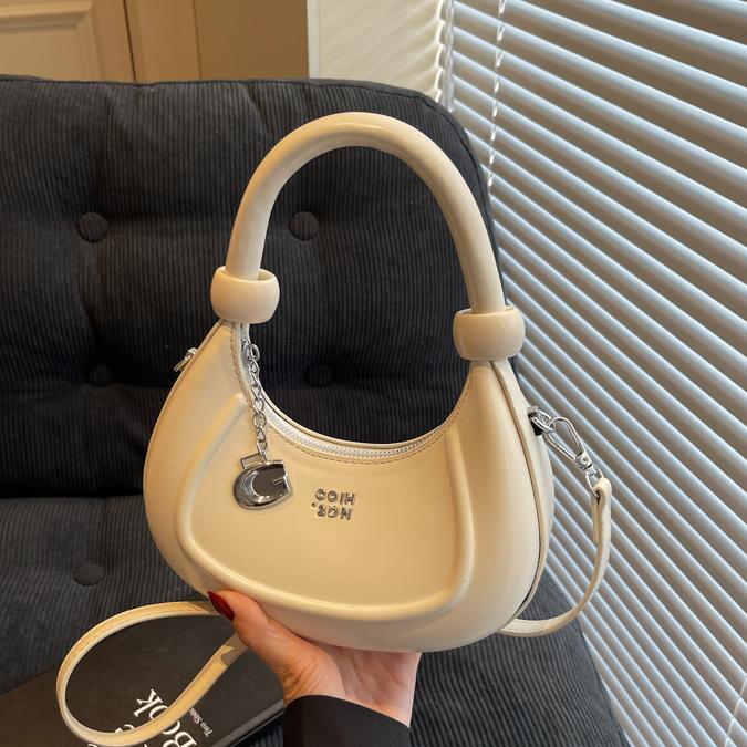Bolsos de diseño de nicho de tendencia transfronteriza para mujer 2025 nuevo bolso de hombro retro salvaje bolso de axila de moda occidental