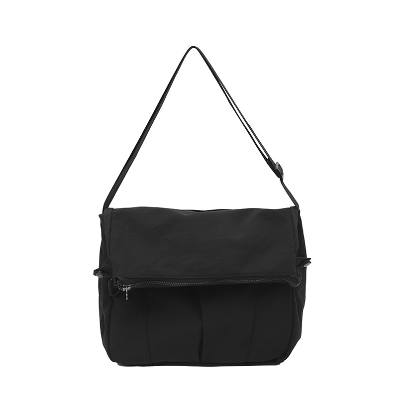 Bolso de lona de moda coreana 2025 verano nuevo bolso femenino estilo universitario bolso de hombro casual bolso de mensajero de gran capacidad marea