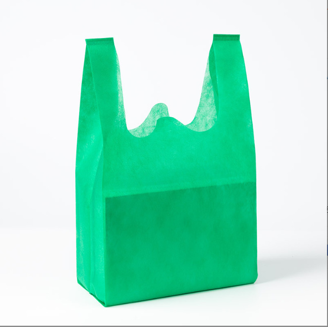 Bolsas de tela no tejida en stock bolsas de compras bolsas de chaleco impresión en color logotipo y patrón publicitario bolsas ecológicas
