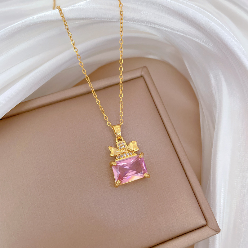 Set collana e orecchini a farfalla con boccetta di profumo_voghion.com