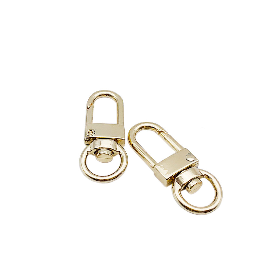 Fábrica directa equipaje hardware accesorios aleación de zinc aleación perro hebilla de alta calidad gancho hebilla cadena colgante bolso pequeña puerta hebilla