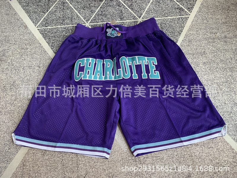 Comercio exterior pantalones de fútbol al por mayor Warriors Lakers 76 caliente Raptor mágico bolsillo bordado pantalones cortos pantalones de baloncesto NFL