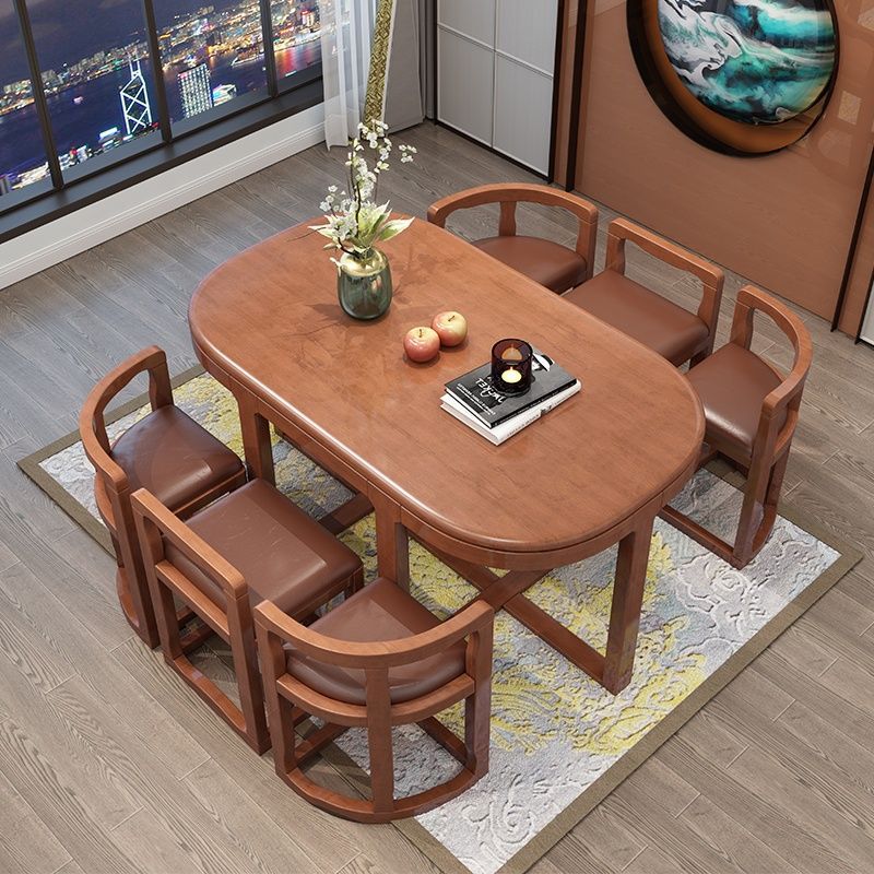 All solid wood Chinese style dining table for home use, set includes solid wood dining chairs, space-saving for small apartments, 1.3m high-end oval dining table