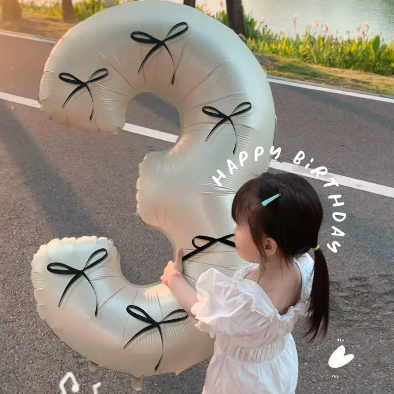 Популярный кремовый воздушный шар с большим количеством бантов из алюминиевой пленки в балетном стиле для фотосессии на день рождения ребенка одного года