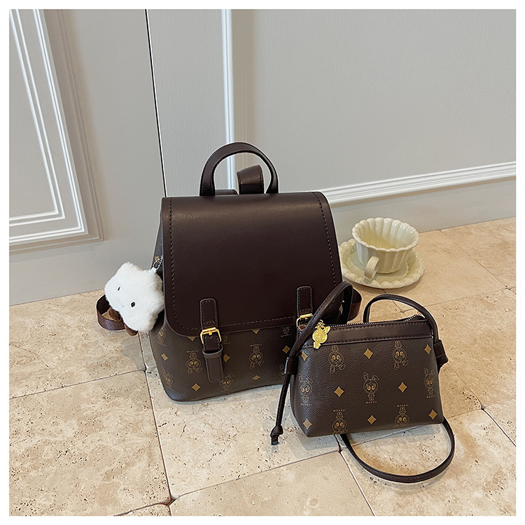 This is a niche design for women, featuring cartoon animal prints. It is a pink backpack with a high level of appearance and large capacity for travel undefined