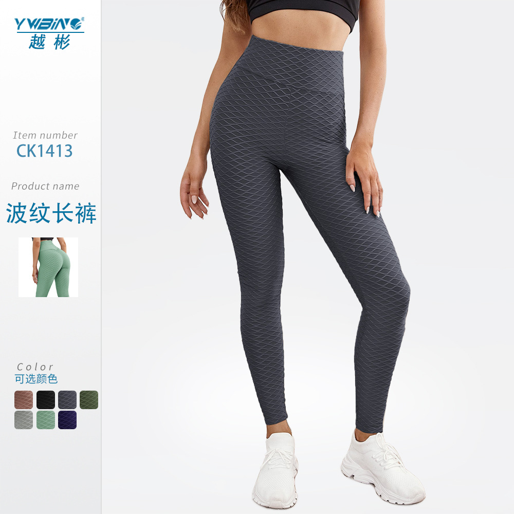 ¡En stock! Europa y América popular melocotón hip lifting onda patrón jacquard yoga burbuja pantalones de cintura alta medias deportivas para las mujeres