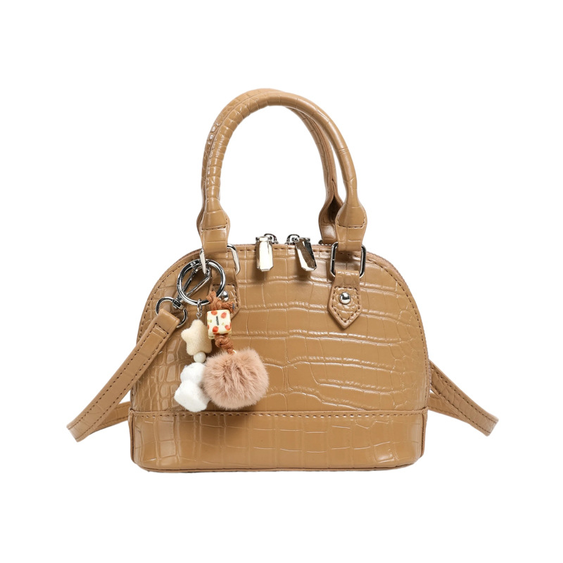 Verano estampado de piedra sensación diaria bolso de mano para mujeres 2026 nueva moda viaje bolsa de hombro bolsa de concha de tramo inclinado