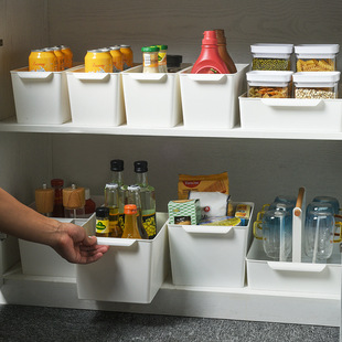 Household kitchen shelves drawer drawer storage basket snack drink with hand holding the box seasoning storage box