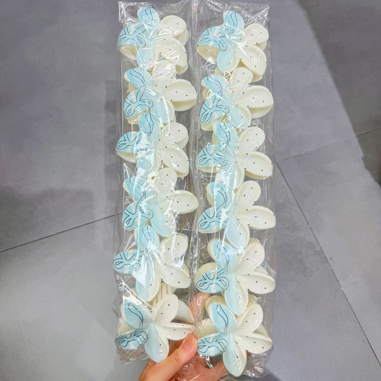 Europa y los Estados Unidos explotaron 8CM huevo flores clip de cabello de alta calidad para mujeres agarrar el cabello de tiburón color caramelo transfronterizo agarrar clip de cabello