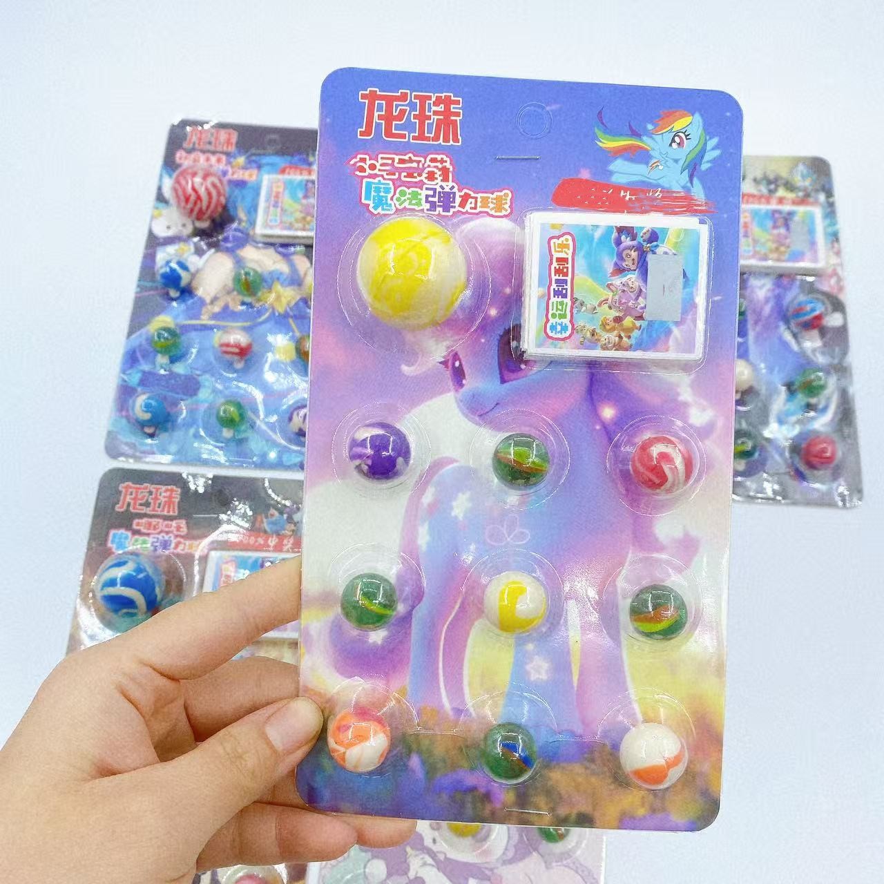 Juguetes de rompecabezas infantiles nostálgicos bolas de dragón dibujar bolas de vidrio caja ciega alrededor de la escuela tienda al por mayor 2 yuanes