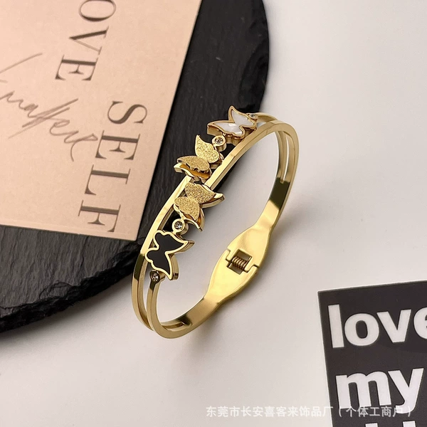 Z107 black and white butterfly golden color