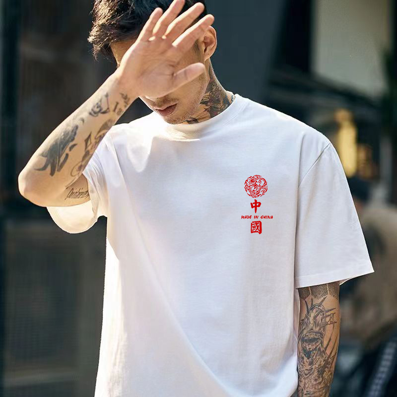 Verano hombre camiseta de moda juvenil blanco puro cuello redondo impresión de topas casuales retro pareja