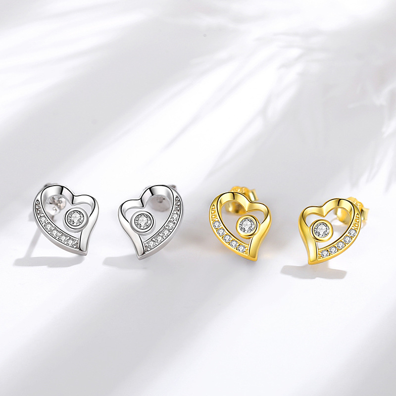 Pendientes de plata esterlina S925 pendientes encantadores de plata de aguja de plata 925 al por mayor pendientes de estilo europeo y americano en forma de corazón incrustados en diamantes para mujeres