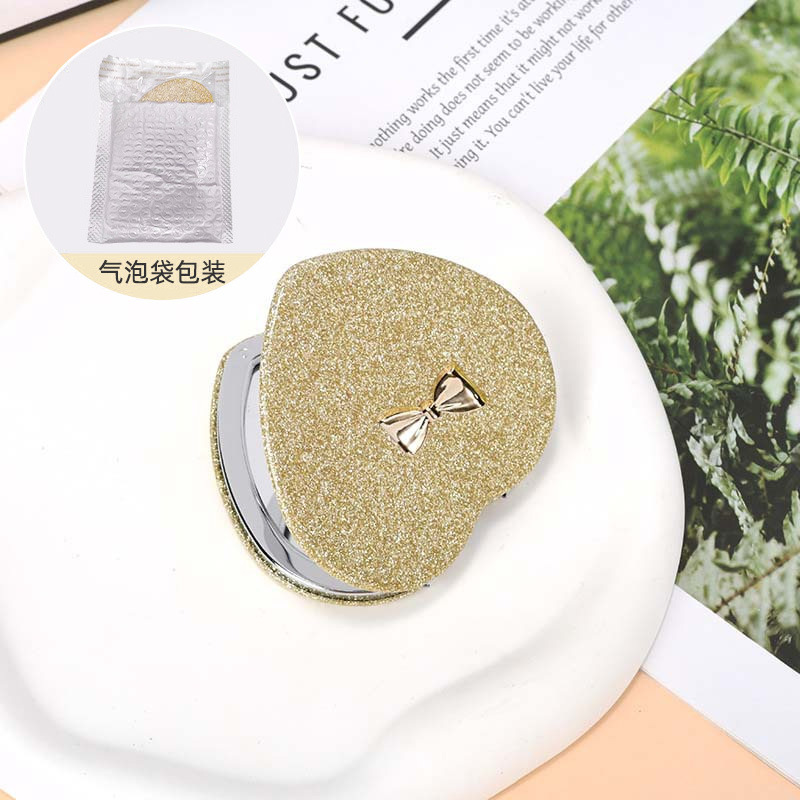 Espejo pequeño de amor de alto valor con mini dormitorio de estudiante espejo plegable de doble cara espejo de maquillaje portátil redondo