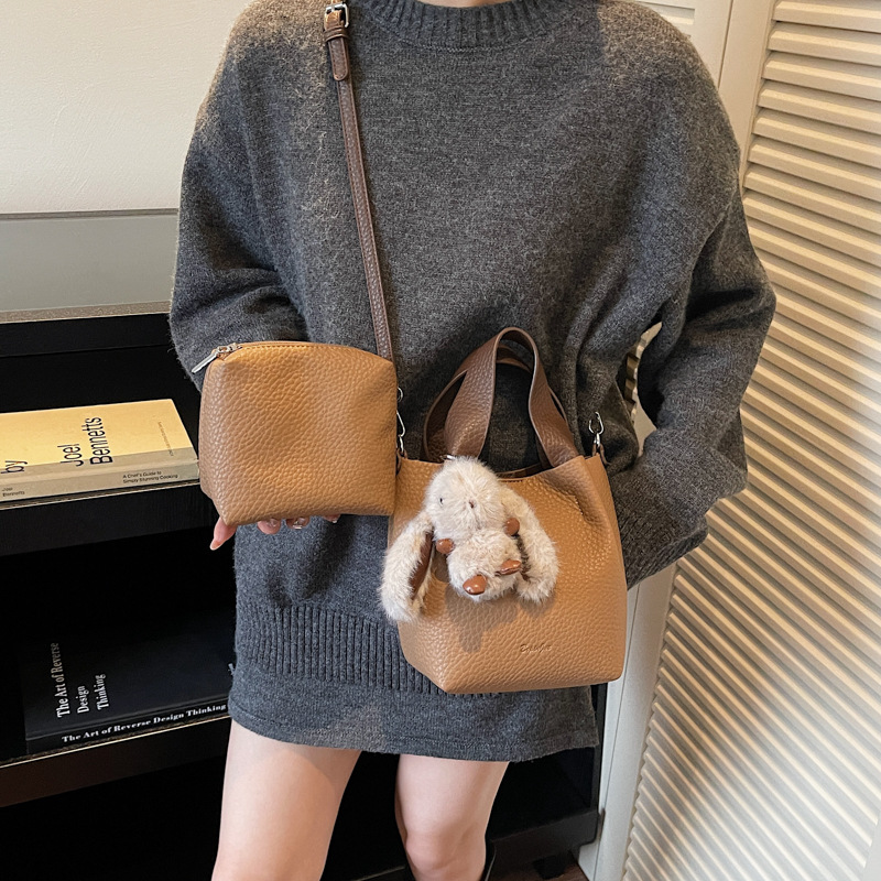 Bolso coreano con estampado de litchi para mujeres 2025 nuevo bolso de cubo de alta calidad de moda versátil bolso de hombro