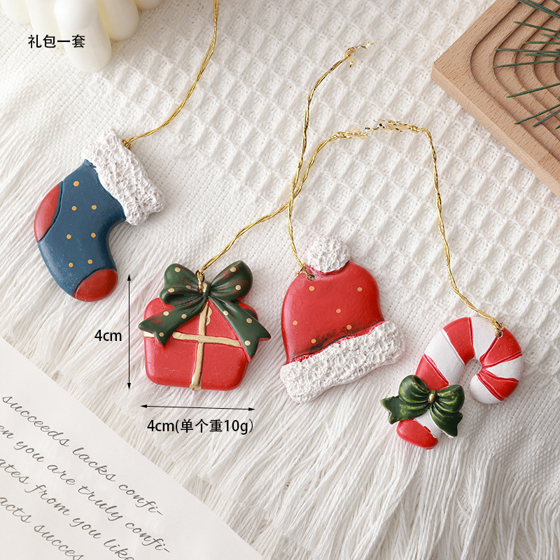 Buscando madera pequeño viejo muñeco de nieve colgante mini resina accesorios de paquete de regalo decoración de Navidad colgante micro paisaje