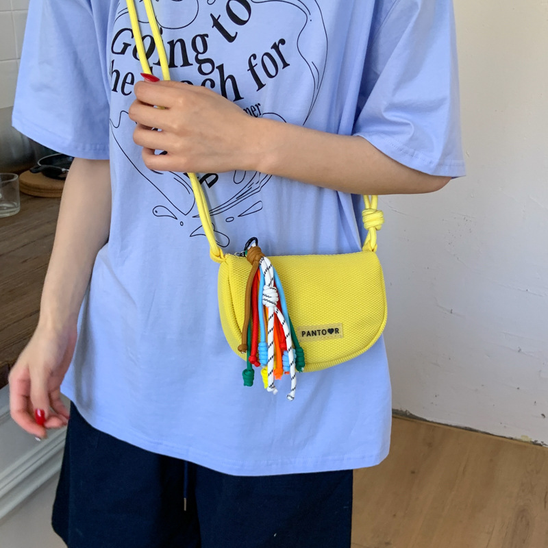 Bolso de lona de moda coreana 2025 verano nuevo bolso femenino casual estilo universitario bolso de hombro bolso de mensajero de malla hueca