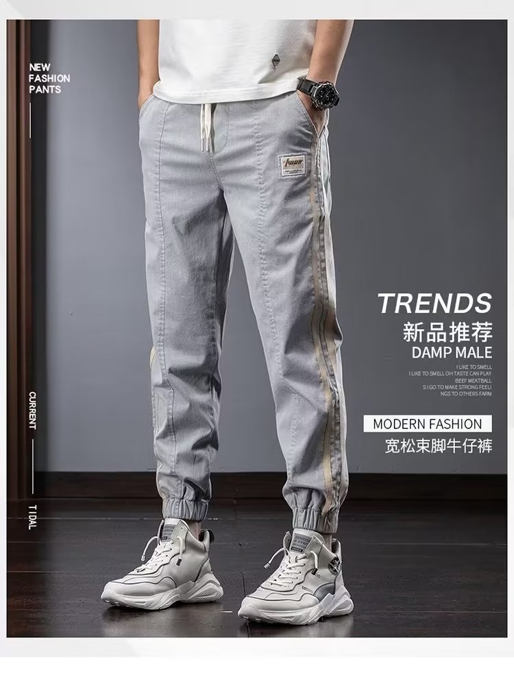 Pantalones de herramientas para hombres, modelos de primavera y otoño, moda de marca de moda, otoño delgado, pies sueltos, pantalones vaqueros de talla grande en forma de cono Harlan para hombres