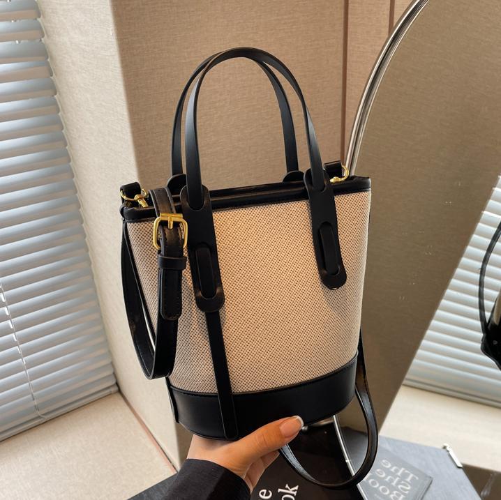 Bolsa de balde de color de contraste popular de este año 2026 nuevo bolso de hombro universal bolso de viaje simple de alta calidad