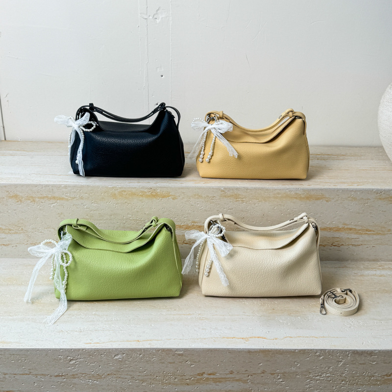 Bolsa de hombro portátil de gran capacidad para mujeres 2026 sensación cotidiana de lichi estampado bolso de almohada coreano bolso de brazo