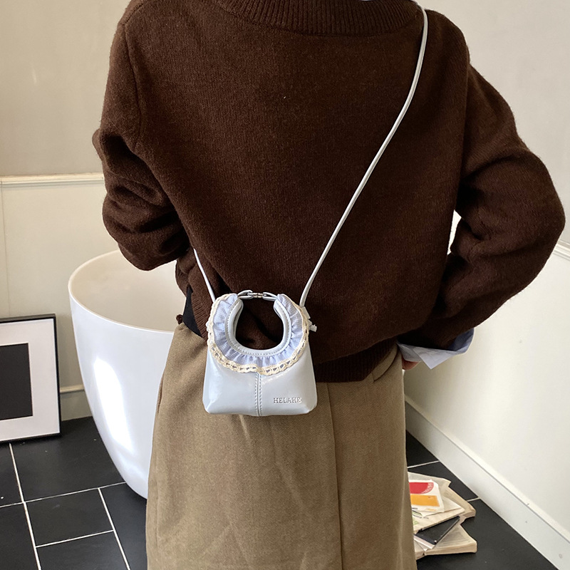 Bolsos infantiles transfronterizos dulces pequeños bolsos de encaje frescos exquisitos mini bolsos de hombro para niños y niñas