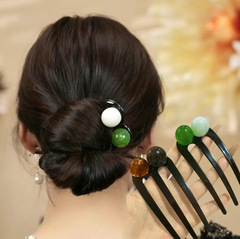 震え音の気質の団子の頭はヘアピンの頭を巻いて女性のシンプルなファッションのレトロな髪飾りに出かけます。