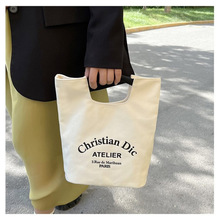 手提饭盒袋子便当学生化妆包包帆布上班族水桶饭袋大容量简约布包